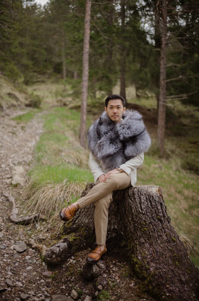 man wearing wide silver fox fur pelerine