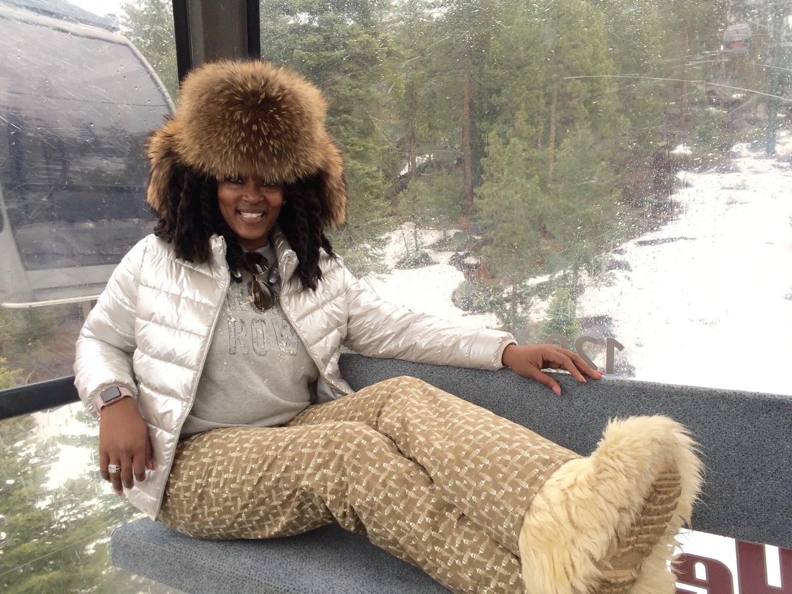woman wearing full fur ushanka with russian raccoon fur
