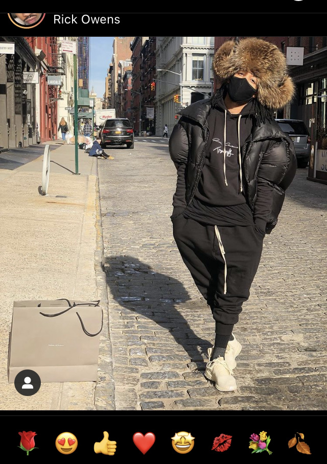man wearing full fur Russian ushanka hat with raccoon fur in Rick Owens outfit
